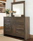 Juararo King Panel Bed with Mirrored Dresser and Chest