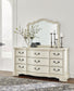 Arlendyne California King Upholstered Bed with Mirrored Dresser